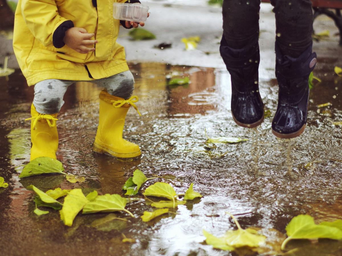Children Splashing In Puddle Xavi Cabrera